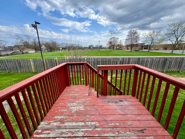 a balcony view with a garden view