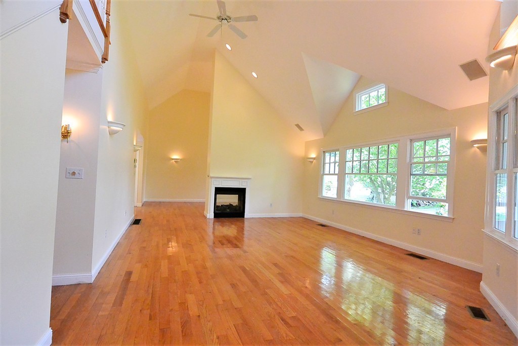 2 Prince Street Beverly, MA 01915 - Photo 12 of 30 wooden floor in an empty room with a window