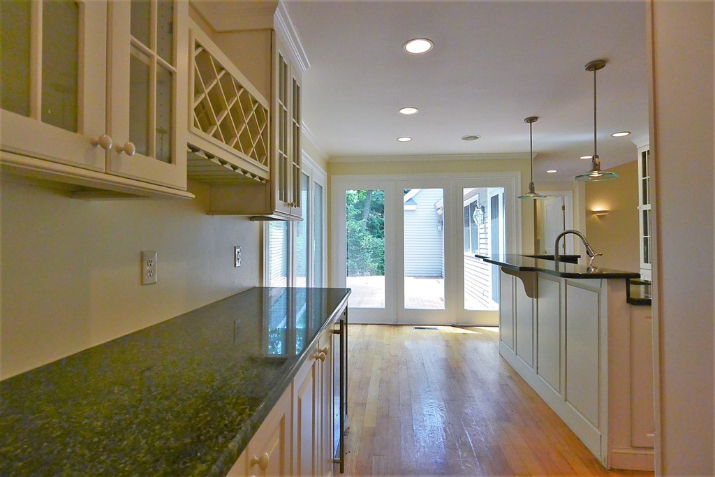 2 Prince Street Beverly, MA 01915 - Photo 18 of 30 a view of a kitchen center island and stainless steel appliances
