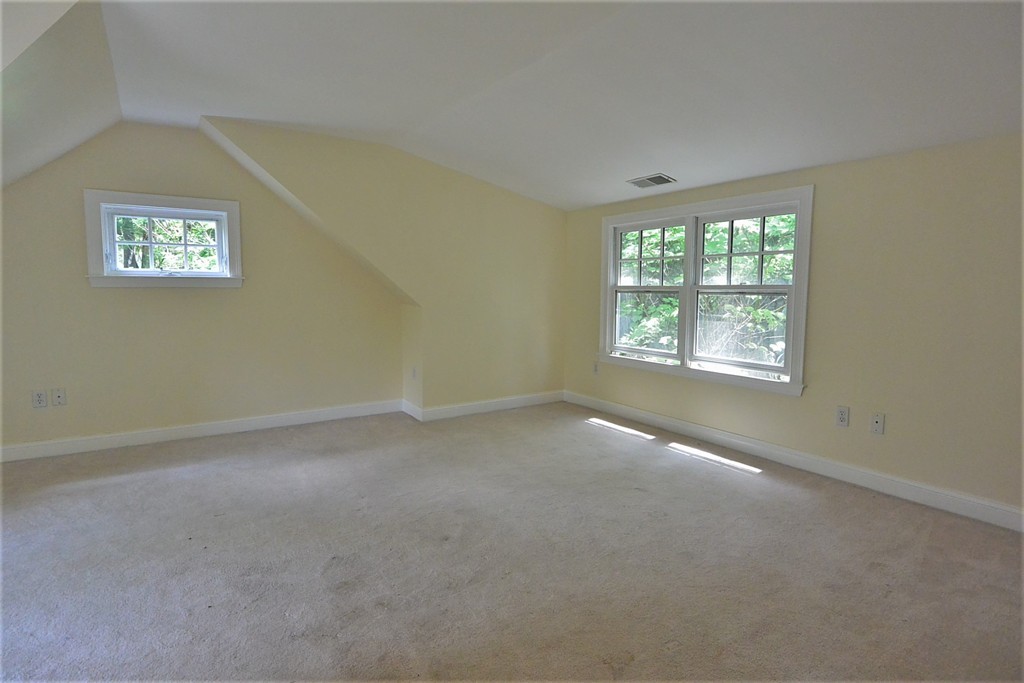 2 Prince Street Beverly, MA 01915 - Photo 22 of 30 an empty room with a empty space and windows