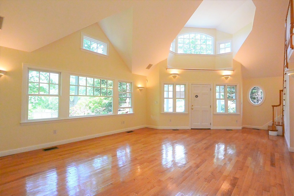 2 Prince Street Beverly, MA 01915 - Photo 7 of 30 a view of an empty room with a window and wooden floor