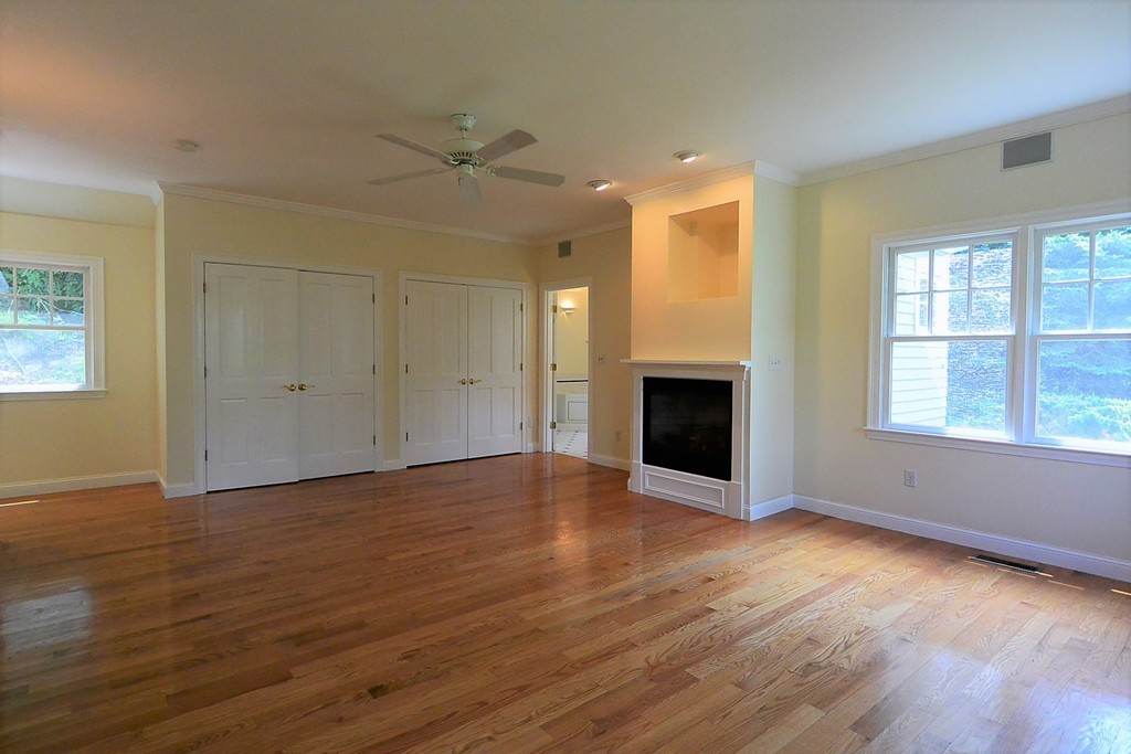 2 Prince Street Beverly, MA 01915 - Photo 9 of 30 an empty room with wooden floor and windows
