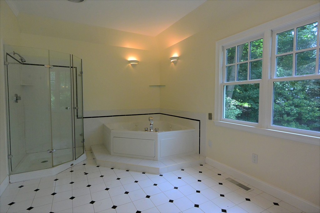 2 Prince Street Beverly, MA 01915 - Photo 10 of 30 a bathroom with a bathtub and a shower