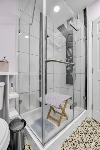 a bathroom with a bathtub and toilet
