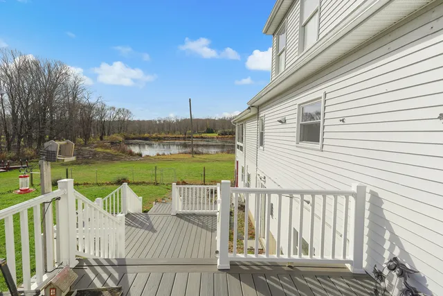 a view of a lake with a big yard