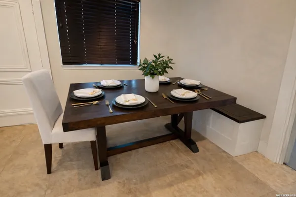 a view of a workspace with furniture