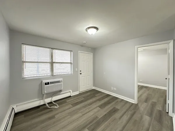 wooden floor and windows in a room