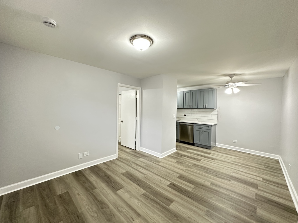 4616 North Beacon Street, Unit 2F Chicago, IL 60640 - Photo 9 of 21 a view of a kitchen with an empty space and a window