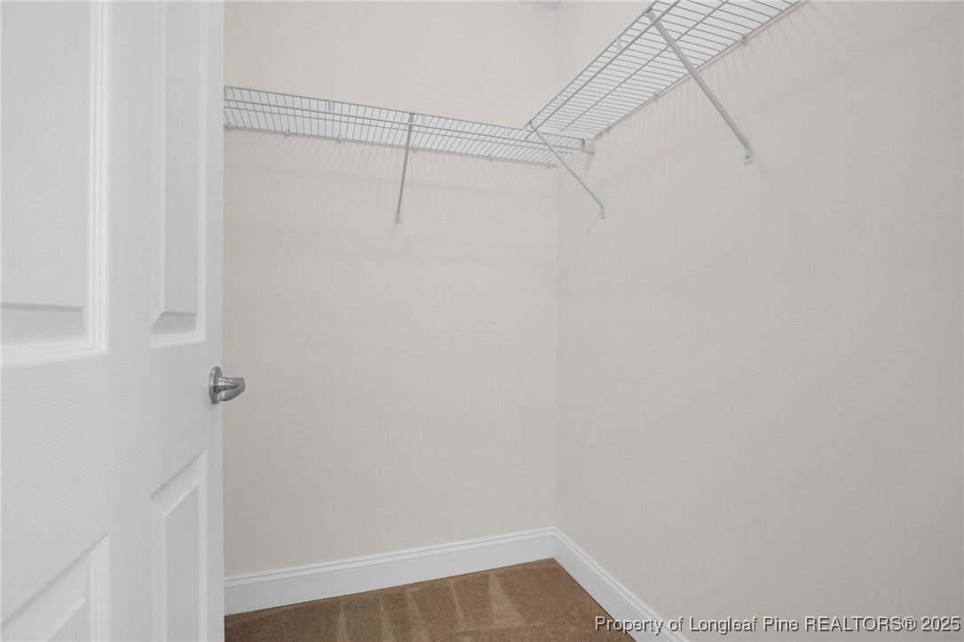 28 Hunter's Run Avenue Pembroke, NC 28372 - Photo 25 of 32 a view of small space with racks on the wall