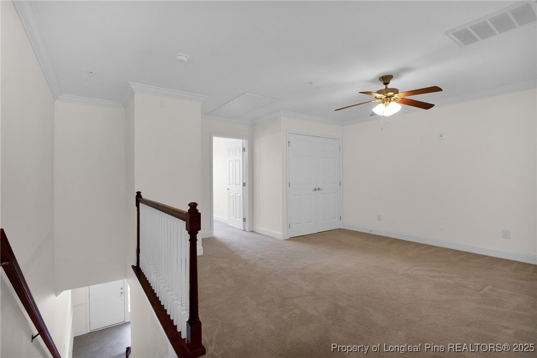 28 Hunter's Run Avenue Pembroke, NC 28372 - Photo 26 of 32 wooden floor in an empty room with a window