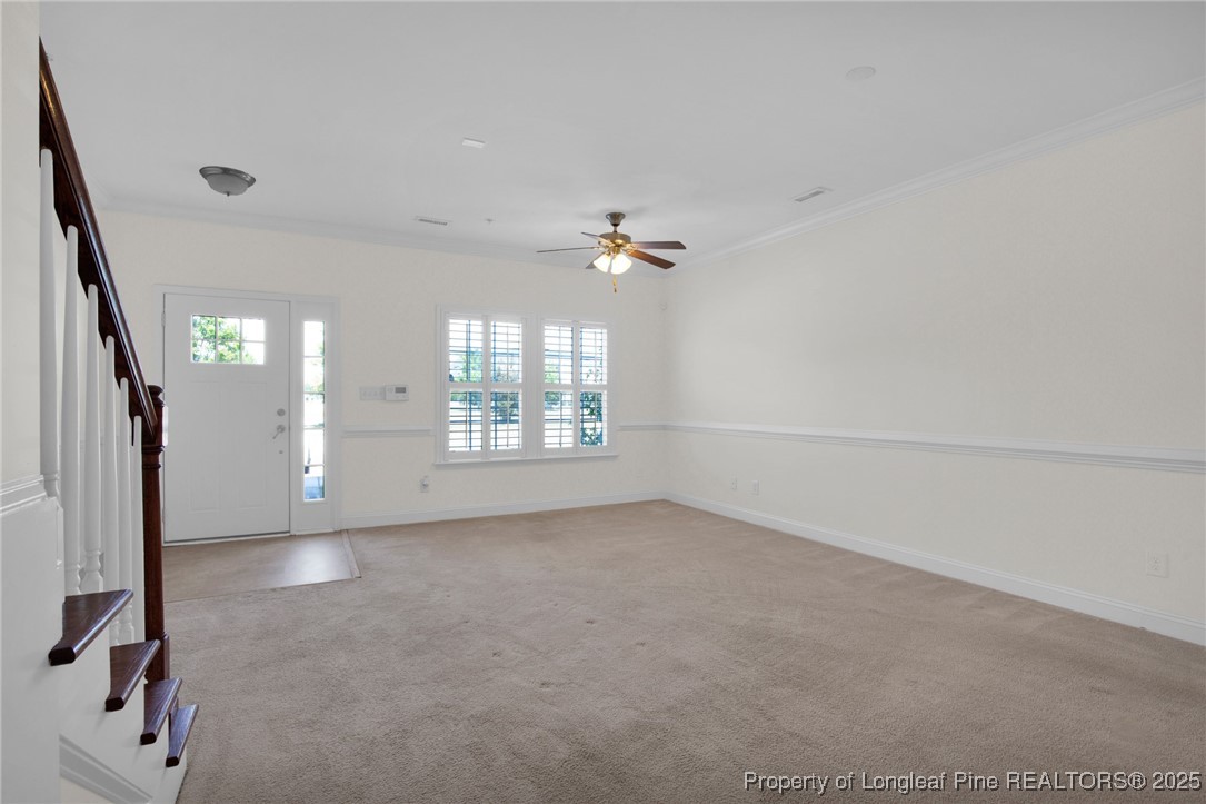 28 Hunter's Run Avenue Pembroke, NC 28372 - Photo 10 of 32 wooden floor in an empty room with a window