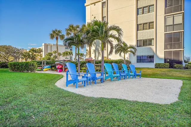 a view of swimming pool with outdoor seating