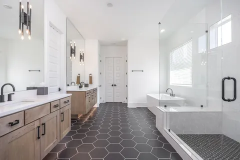 a view of a livingroom with furniture and a hallway