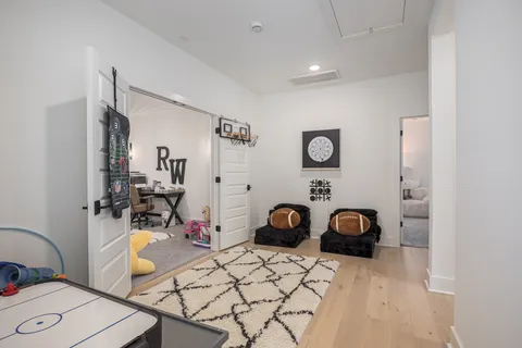 a view of entryway with a couches and a fireplace