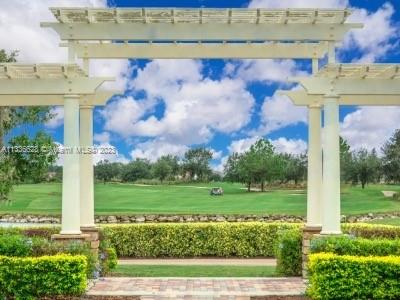 13646 Abberwick Drive Orlando, FL 32832 - Photo 32 of 50 a view of a park that has a fountain in it