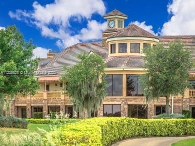 13646 Abberwick Drive Orlando, FL 32832 - Photo 38 of 50 front view of house with a yard