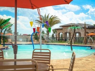 13646 Abberwick Drive Orlando, FL 32832 - Photo 39 of 50 a front view of building with yard