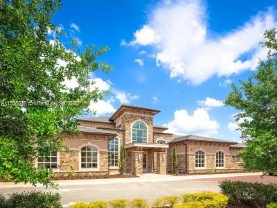 13646 Abberwick Drive Orlando, FL 32832 - Photo 47 of 50 front view of a house with a street