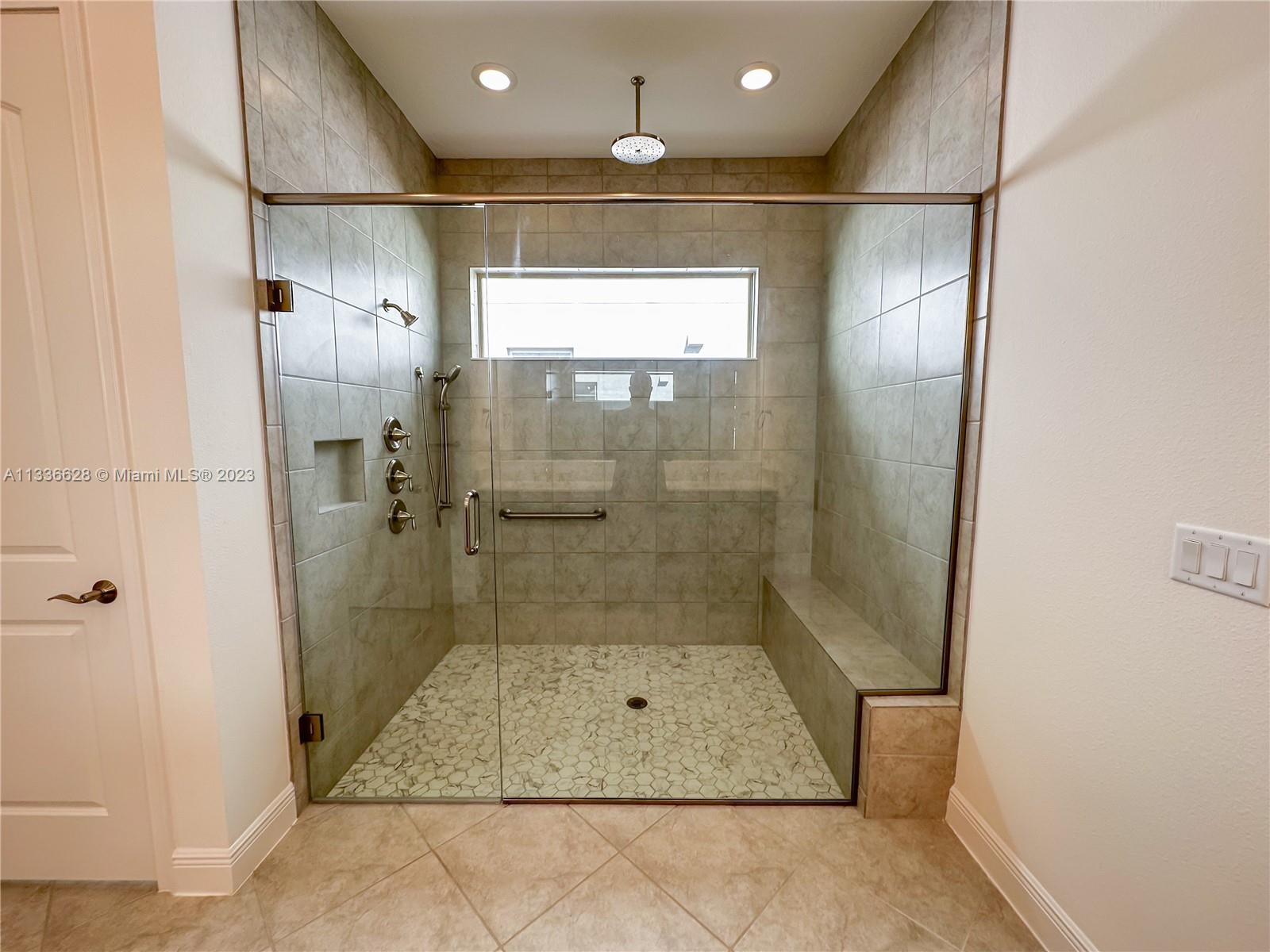 13646 Abberwick Drive Orlando, FL 32832 - Photo 8 of 50 a bathroom with a shower