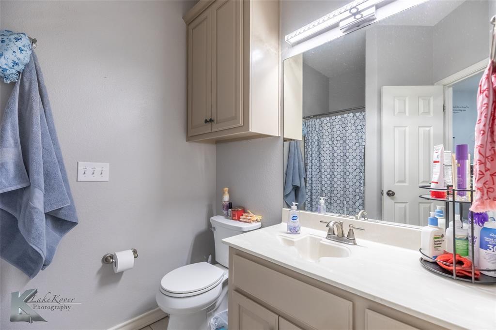 1834 Marathon Court Abilene, TX 79601 - Photo 20 of 39 a bathroom with a sink and a toilet