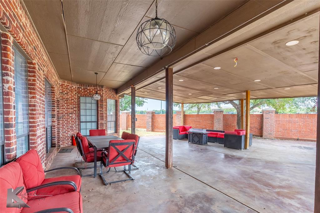 1834 Marathon Court Abilene, TX 79601 - Photo 30 of 39 a living room with blue painted walls