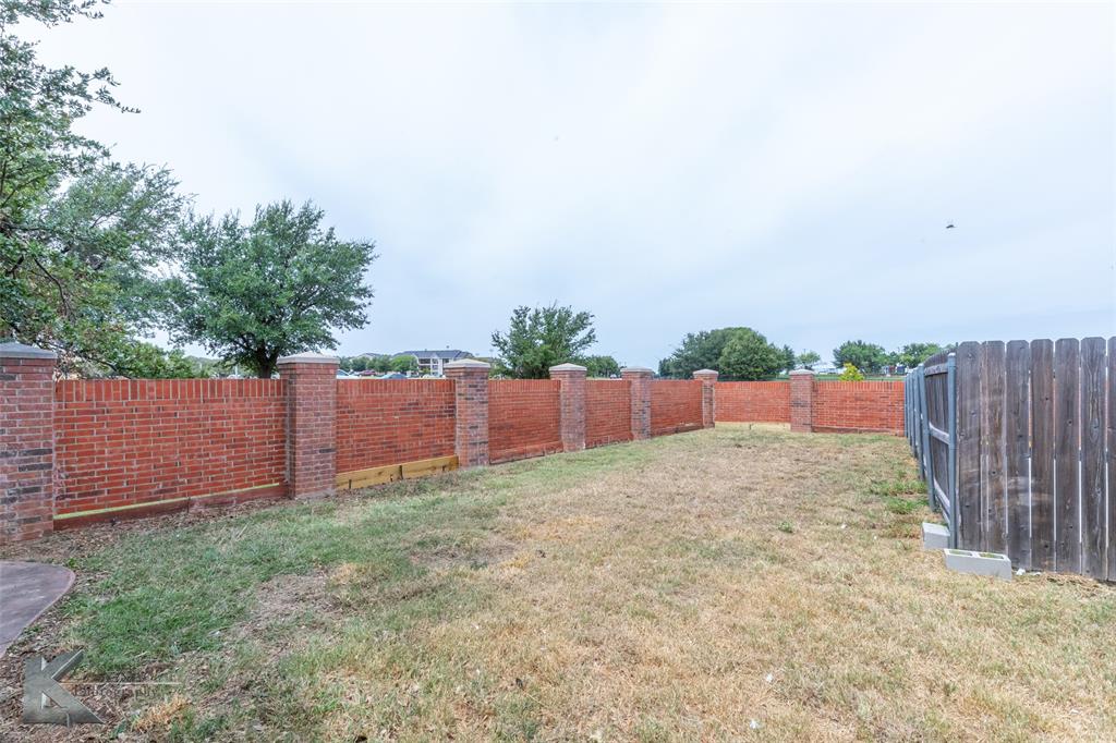 1834 Marathon Court Abilene, TX 79601 - Photo 34 of 39 a view of backyard with wooden fence