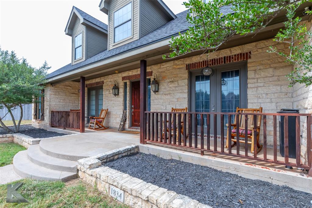 1834 Marathon Court Abilene, TX 79601 - Photo 4 of 39 a view of a house with a yard and porch
