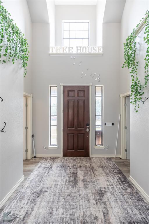 1834 Marathon Court Abilene, TX 79601 - Photo 5 of 39 an empty room with windows and closet