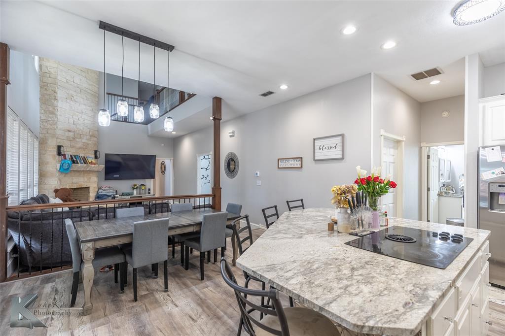 1834 Marathon Court Abilene, TX 79601 - Photo 10 of 39 a large kitchen with a table and chairs