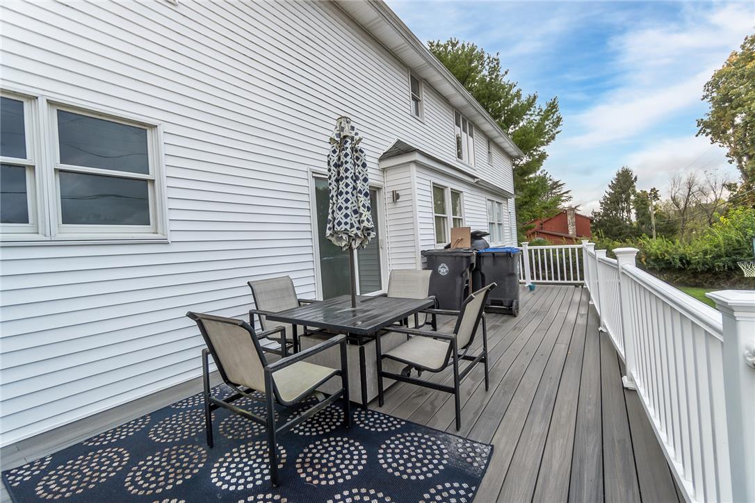 755 Yorkshire Road Allentown, PA 18103 - Photo 49 of 66 A spacious wooden deck with crisp white railings lines the back of the home.