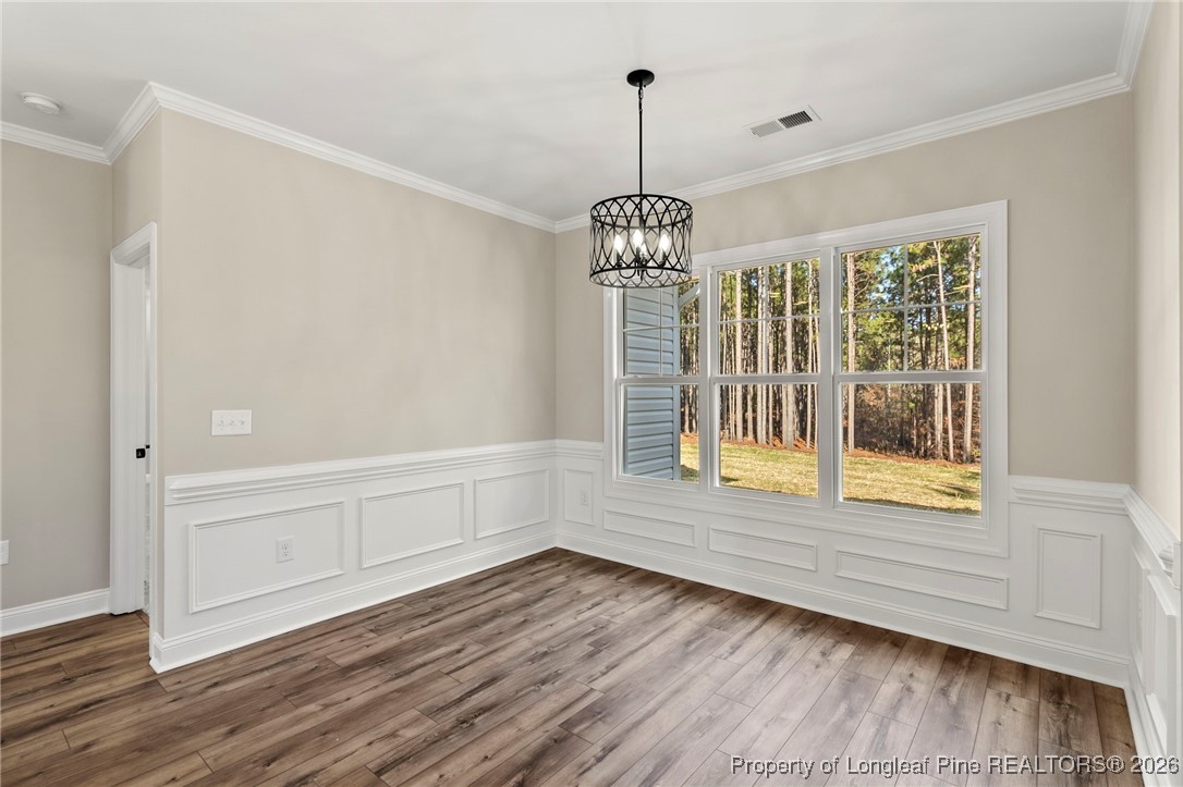 940 Rhum Drive Fayetteville, NC 28311 - Photo 28 of 45 a view of empty room with wooden floor and fan