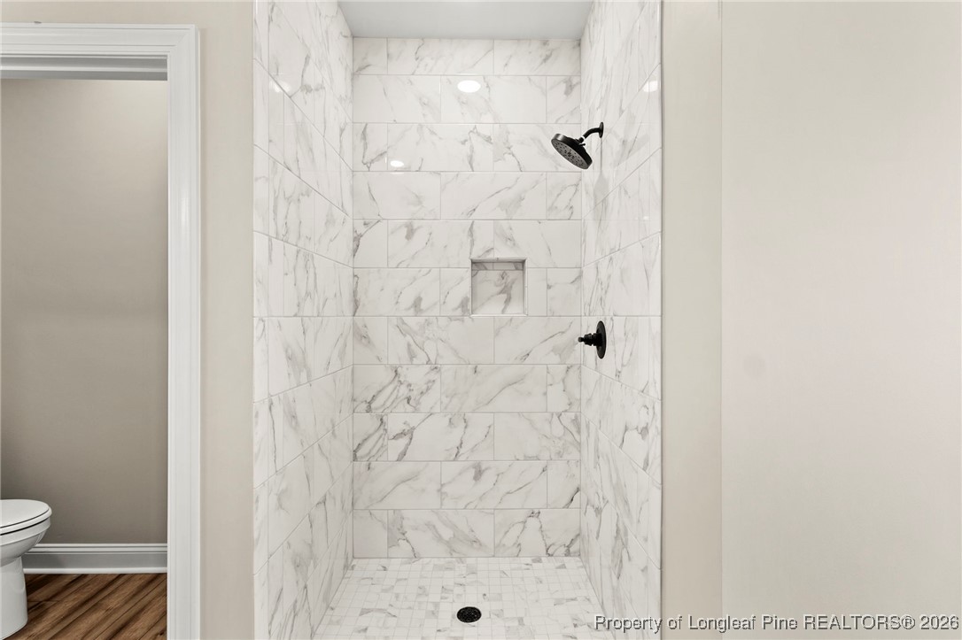 940 Rhum Drive Fayetteville, NC 28311 - Photo 35 of 45 a bathroom with a shower and a toilet