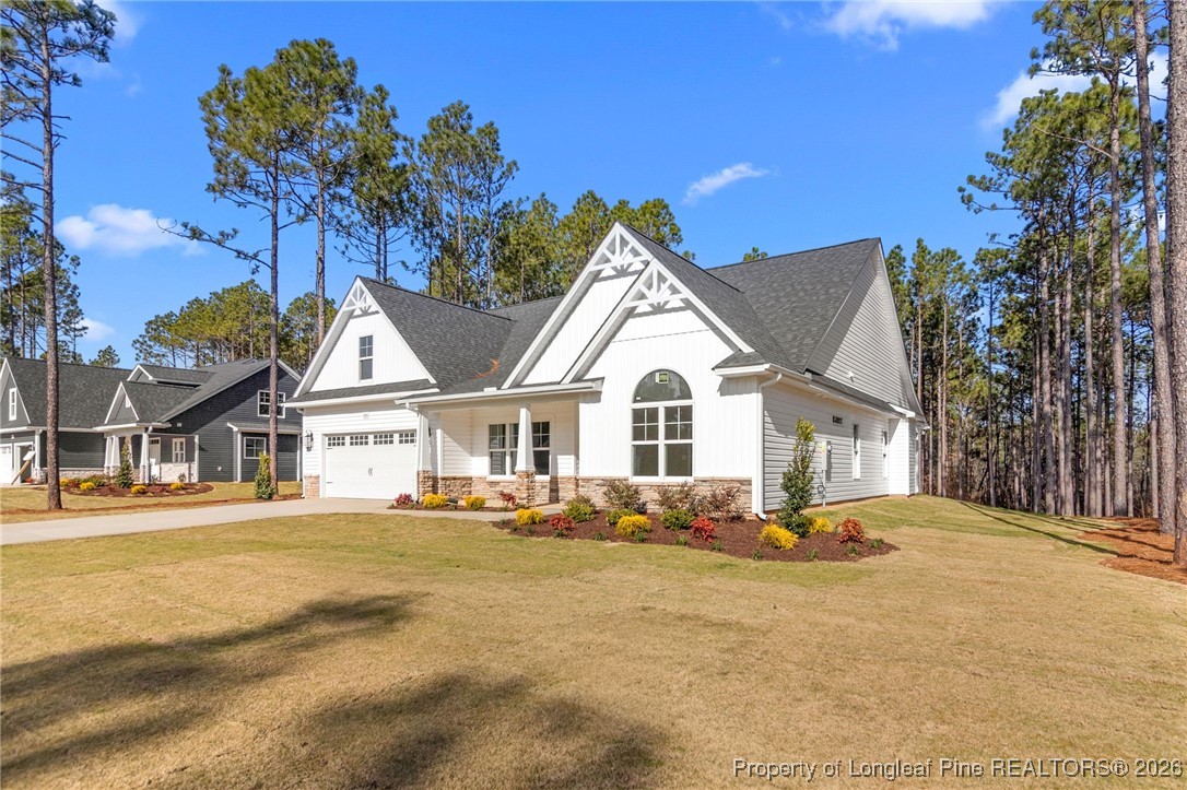940 Rhum Drive Fayetteville, NC 28311 - Photo 4 of 45 a front view of a house with a yard
