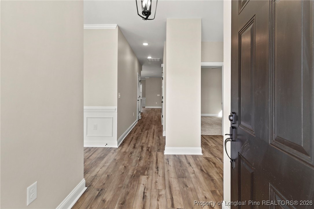 940 Rhum Drive Fayetteville, NC 28311 - Photo 6 of 45 a view of hallway with wooden floor