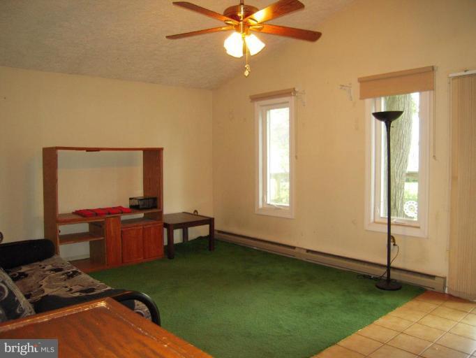 313 Londontown Road Edgewater, MD 21037 - Photo 21 of 25 a living room with furniture and a window