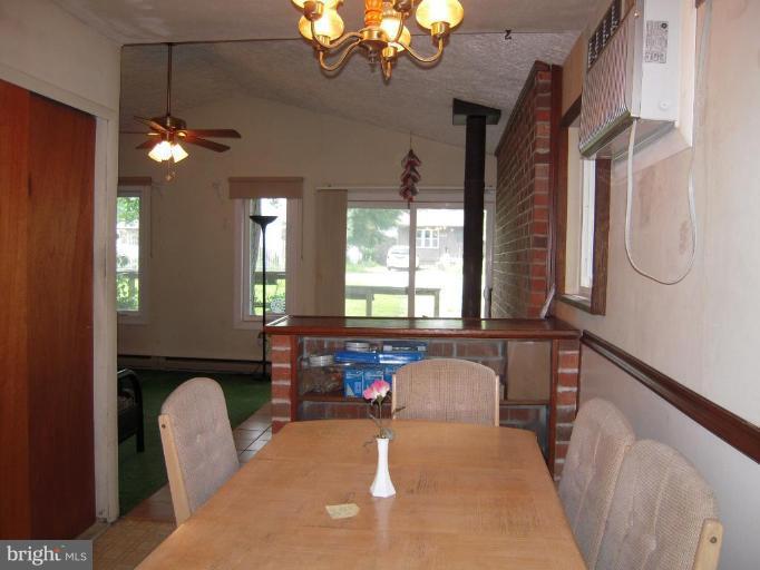 313 Londontown Road Edgewater, MD 21037 - Photo 4 of 25 a view of a livingroom with furniture and windows