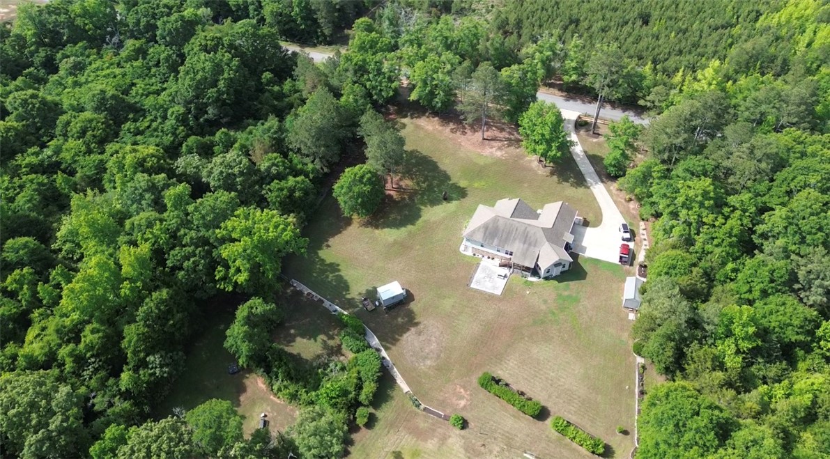 190 Fred Bradford Road Iva, SC 29655 - Photo 29 of 32 This aerial view showcases a peaceful home surrounded by a lush, green landscape and private driveway.