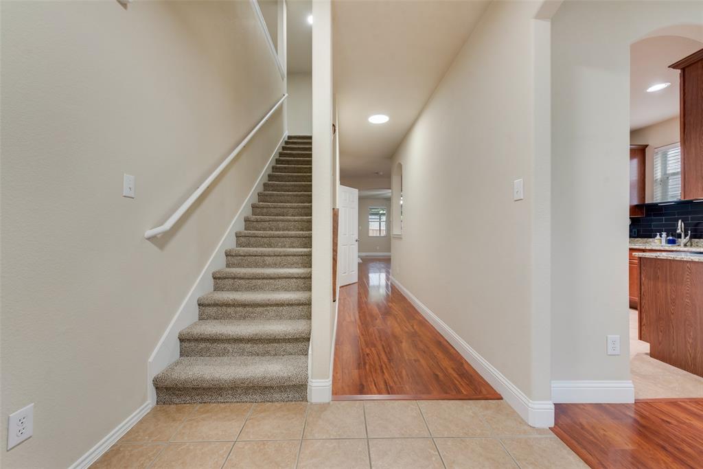 4521 Indian Paint Way Denton, TX 76208 - Photo 12 of 36 a view of entryway and hall with wooden floor