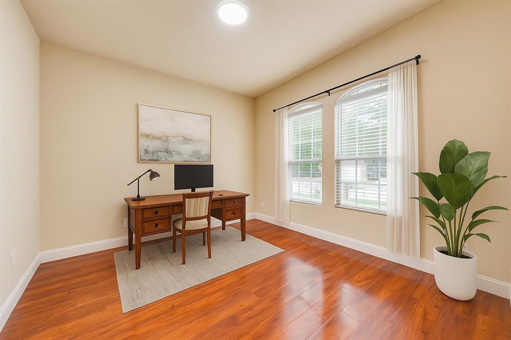 4521 Indian Paint Way Denton, TX 76208 - Photo 13 of 36 a workspace with furniture window and wooden floor
