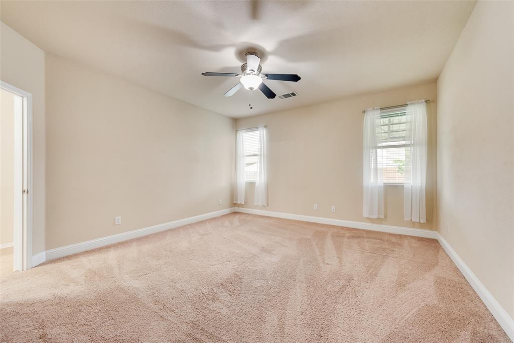 4521 Indian Paint Way Denton, TX 76208 - Photo 18 of 36 a view of an empty room with a window