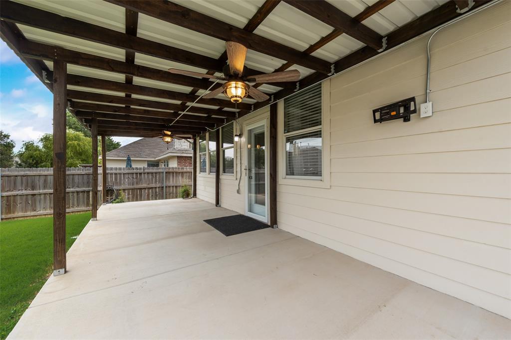 4521 Indian Paint Way Denton, TX 76208 - Photo 33 of 36 a view of porch with a table and chairs