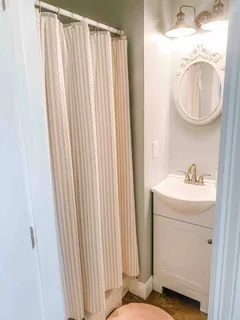 a utility room with a sink dryer and washer