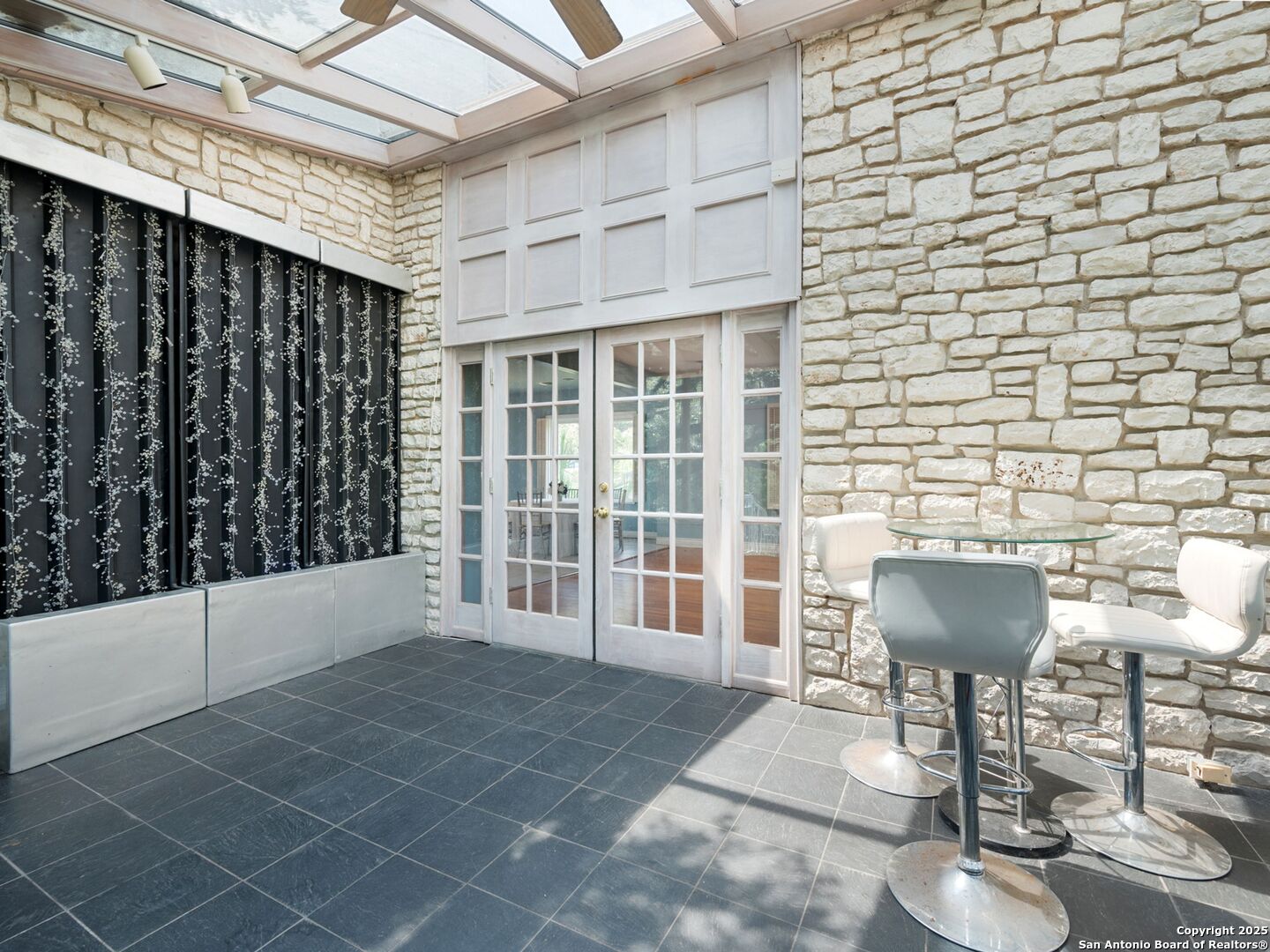6472 Whitby Road San Antonio, TX 78240 - Photo 12 of 23 a view of a living room and a balcony