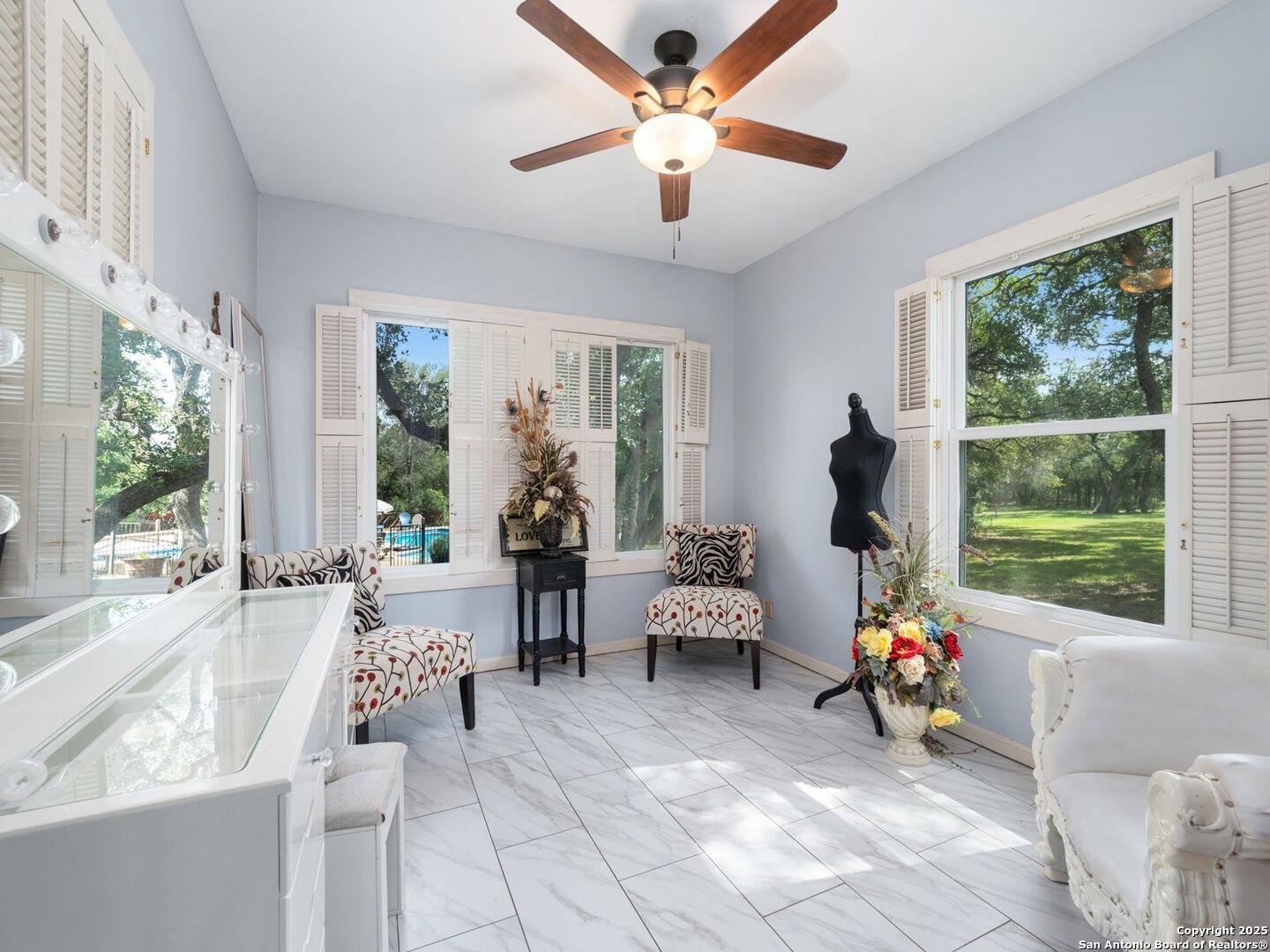 6472 Whitby Road San Antonio, TX 78240 - Photo 13 of 23 a living room with furniture and floor to ceiling windows