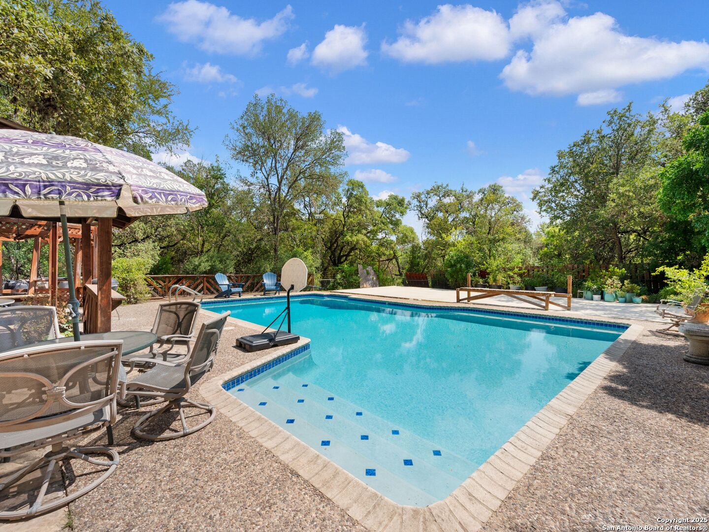 6472 Whitby Road San Antonio, TX 78240 - Photo 17 of 23 a view of a swimming pool with a patio