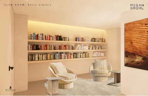 a living room with furniture and a book shelf