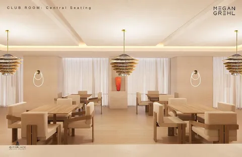 a living room with lots of white furniture and windows