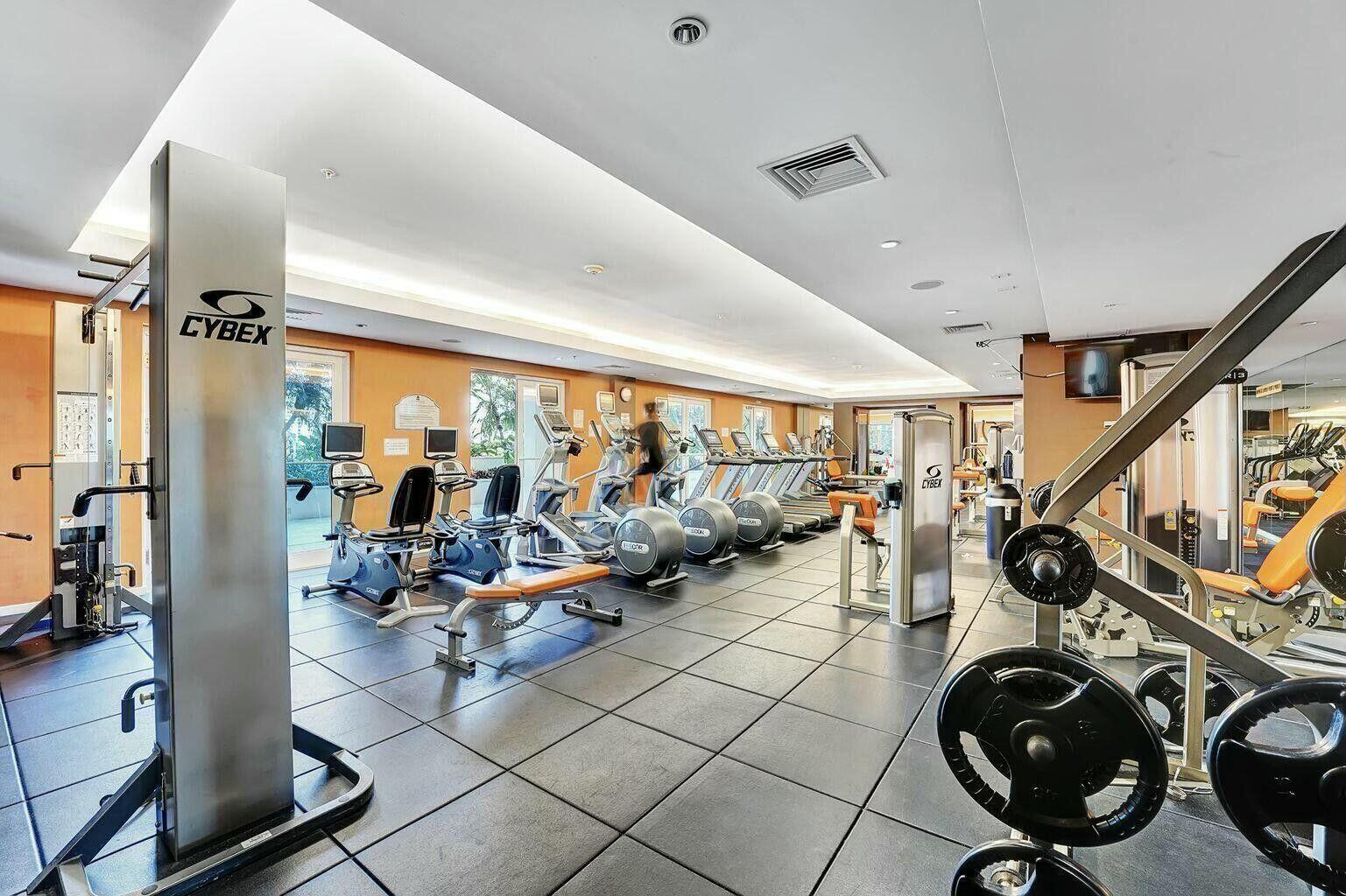 550 Okeechobee Boulevard, Unit 1401 West Palm Beach, FL 33401 - Photo 41 of 46 a view of a room with gym equipment