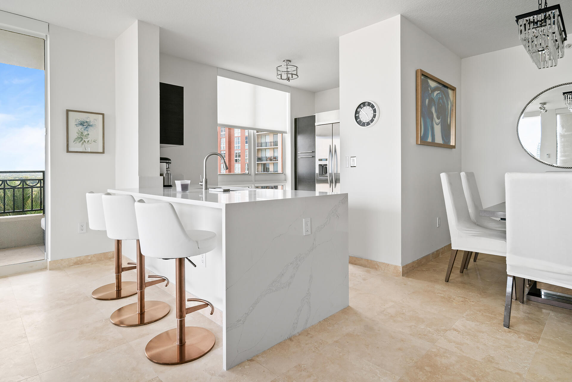 550 Okeechobee Boulevard, Unit 1401 West Palm Beach, FL 33401 - Photo 5 of 46 a view of a dining room with furniture