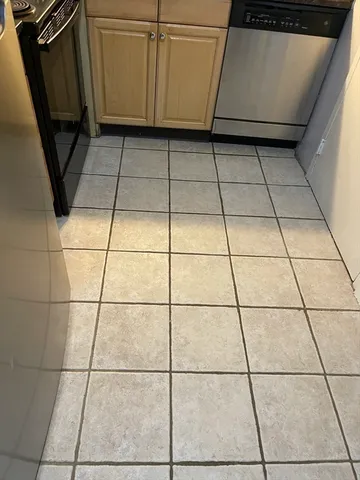 a view of closet with wooden floor